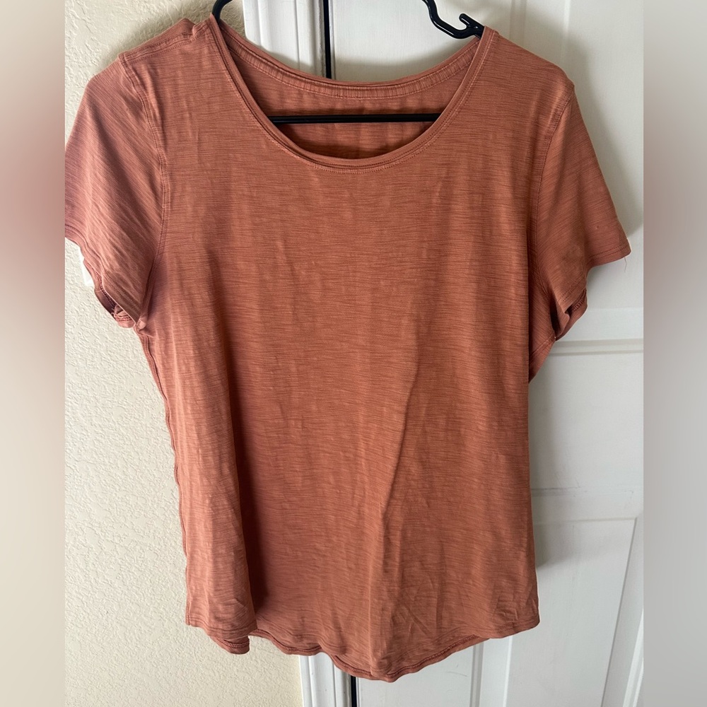 Orange lululemon tshirt